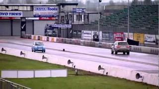 SureMen V8 Races: Think City Electric Car Vs BMW X5 V8