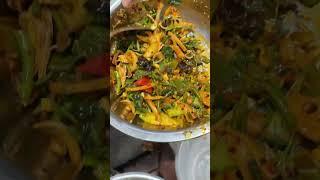 Buy a spicy vegetarian dish on the street and take a look at what dishes it contains?