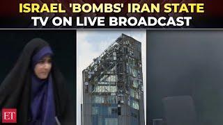 Watch moment Israeli missiles hit Iran’s state TV live on air, anchor flees as studio 'explodes'