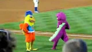 Famous Chicken battles Barney in a dance-off!