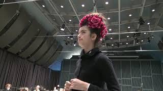 Angelina Jordan corrects the orchestra on the rehearsal (Speak softly love)