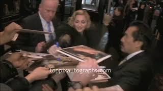 Madonna signs autographs for TopPix