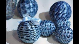 Woven ball shaped decoration for a Christmas tree