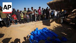 Bodies of 88 Palestinians buried after being returned to Gaza by Israel