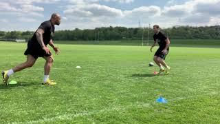 Netani Talei (Fiji rugby) and Karl Dickson perform a Rugby drill to help with your tackling