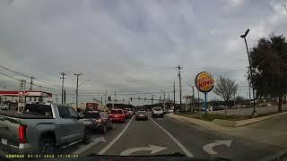 Car uses dedicated right turn lane to go straight