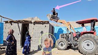 Love of Ali and Sakineh.  Building the roof of the house with a loader. 