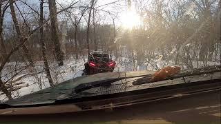 Woods riding in the snow in the f150