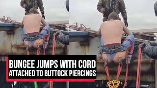 Russian daredevil bungee jumps with cord attached to buttock piercings | Cobrapost