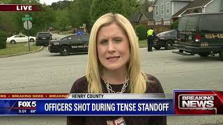 Henry County Police officers shot; hostage situation