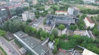 Slow Landing Over Houses In City - cutestockfootage.com