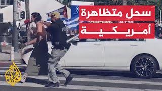 شاهد | لحظة اقتحام ناشطة أمريكية موكب الرئيس بايدن