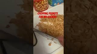 Chopping peanuts for my cookies #cookies #baking #peanuts #cookiedough #chopping