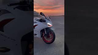 White Ducati V2 Idling at Sunset