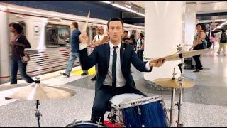 Joseph Gordon-Levitt plays the drums in a subway