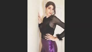 A Bold Look: Crossdresser Michelle Diaz slays in eye-catching Purple Leggings!