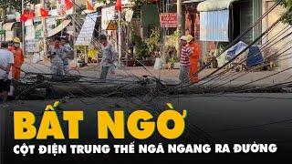 Cột điện trung thế ngã ngang đường dù không mưa gió