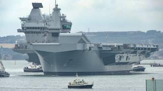 Aircraft carrrier HMS Queen Elizabeth returns to sea after being in Portsmouth for summer