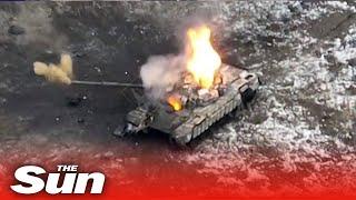 Moment Ukrainian Kamikaze drone crashes into Russian tank blowing it to pieces