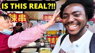 BLACKMAN SPEAKS FLUENT CHINESE IN A CHINESE VILLAGE STREET...THIS HAPPENS NEXT