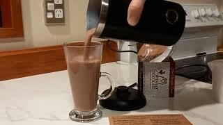 Preparing your Aroha Chocolate Hot Chocolate Drink with milk frother