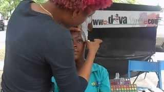 @tiffzmua_ of Diva supplies doing makeup