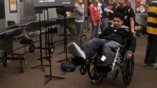 Juan Doing A Wheelie On His Wheelchair