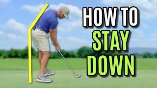 Why Amateur Golfers Can't Stop Standing Up Through The Golf Ball