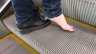 Shoe and sock removal on the escalator