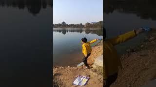 Pradnya enjoyed by throwing the stones into the water #pradnyacreation #ytshorts #shorts #pradnya