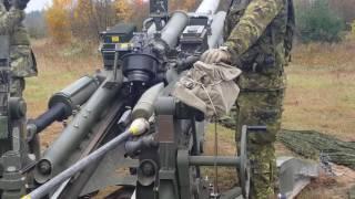 155 MM M777 Howitzer round can be seen flying