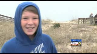 Reporter Katie Garner- Whale washed ashore on Kure Beach