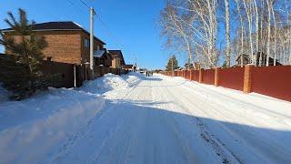 Russian modern village "Usadba Maryino" near Novosibirsk. Winter in Siberia. Life in Russia