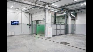 TITAN 3000 KG. A business center underground parking car lift