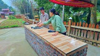 KONG and NHAT complete solid kitchen shelves. Big business plan in the future.Husband and wife unite