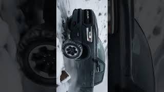 Power meets performance! The RAM Pickup Truck dominates snowy trails with style,strength,and control