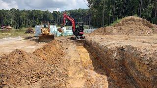 Digging Footings, Flooding Rains Add To Culvert Upgrades!