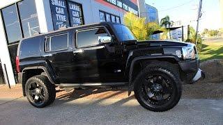 Hummer H3 custom rims 20 inch KMC Rockstar black wheels