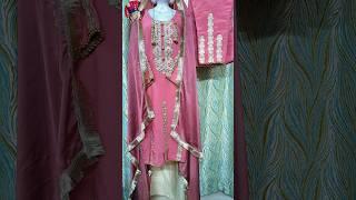 Elegant Pink Traditional Dress with Intricate Golden Embroidery and Tassel Details 