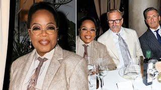 Oprah suits up in bizarre menswear look to mingle with Hollywood gents