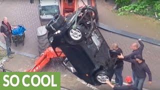 Smart car pulled from Amsterdam canal after "high-speed" chase