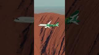 QantasLink Airbus A220 'Minyma Kutjara Tjukurpa' flies over Uluru