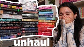 HUGE BOOK UNHAUL | decluttering and reorganizing my bookshelves