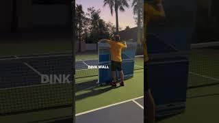 THE Dink Wall by PURE Pickleball easy set-up. First of its kind backboard for practicing at home.