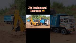 Jcb 5cx backhoe loading mud in Tata truck 2518