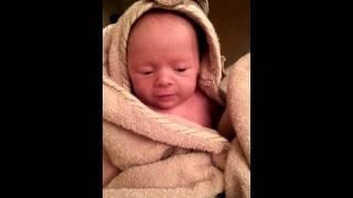 Newborn hates bath time.