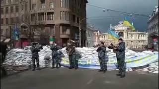 Ukraine military band plays "Don't Worry Be Happy" on Odessa street as they await attack.