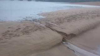 Black Rock River ( mahlongwa) river breaching into the Indian ocean