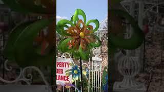 Green and gold garden wind spinner