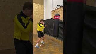 Working on heavy bag, overhand technique #shorts #boxing #boxingtraining